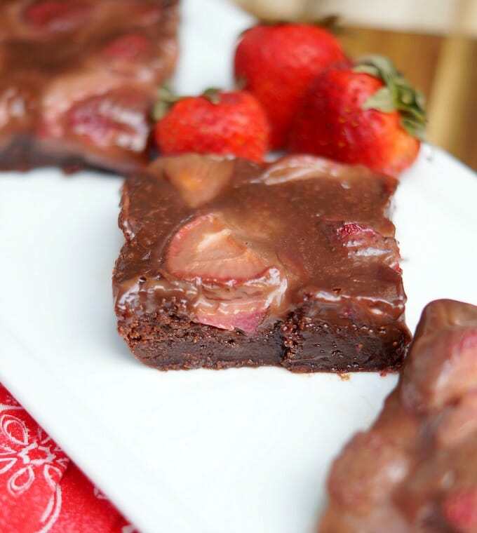 Easy 3 Ingredient Nutella Brownies topped with Strawberries and Nutella Ganache 